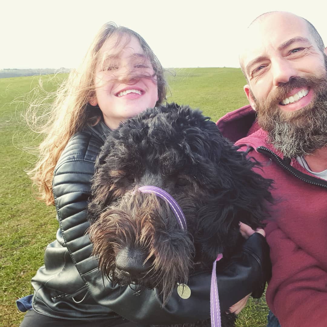 Jon, Kendra and Raven taking a windy walk